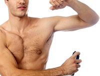 Person spraying deodorant