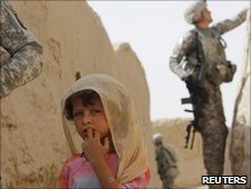 Afghan girl and soldier