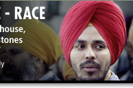 Image of Sikh man in a red turban 