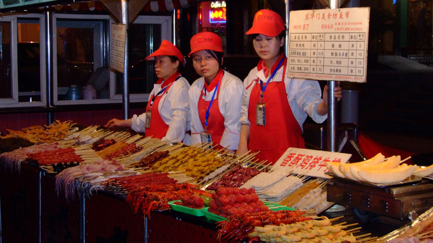 Street vendors in a Beijing street market.