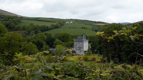 "Kames Castle is by the side of the road walking towards Ettrick Bay."