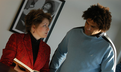 Rebecca helps Colin with his Welsh