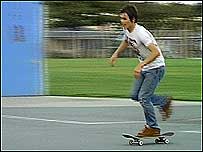 Geoff preparing to do skateboard stunt
