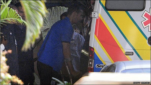 Captain Ferdinand makes his way to hospital on crutches