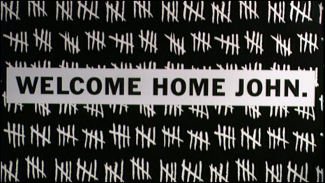 A poster saying "welcome home John" after the release of Beirut hostage John Mccarthy