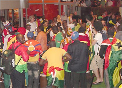 Ghanaian fans converge on the team's hotel following their win over the Czech Republic
