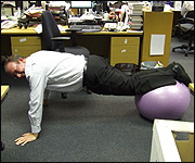 Nick Alliker on an exercise ball