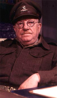 Arthur Lowe as Captain Mannering