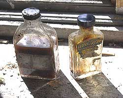 Medicine bottles with liquid still inside