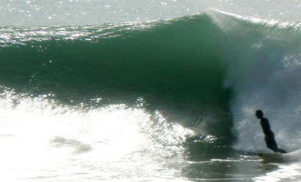 Cool as a goose. Joe finds time to drop his guard as the Moroccan swell towers over him. Pic Amy Williams, Feb 07