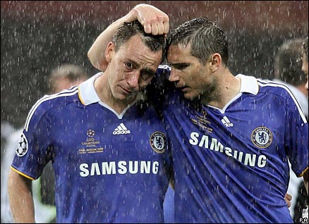 John Terry is consoled by Frank Lampard