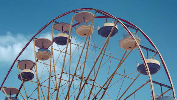 Ferris wheel against a blue sky