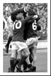Scottish players celebrate Bobby Lennox's goal