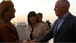 القذافي وبوين