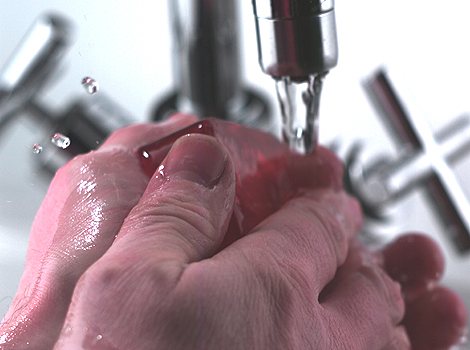 Someone washing their hands