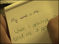 Mo's story being written on a notepad