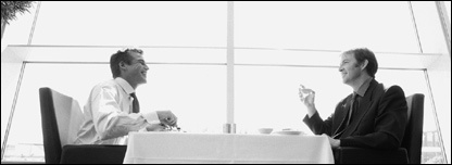 Two men dinning in a restaurant