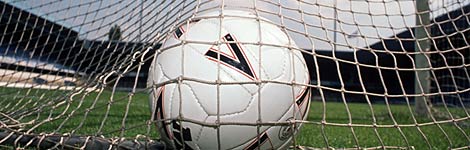 A football at the back of a net