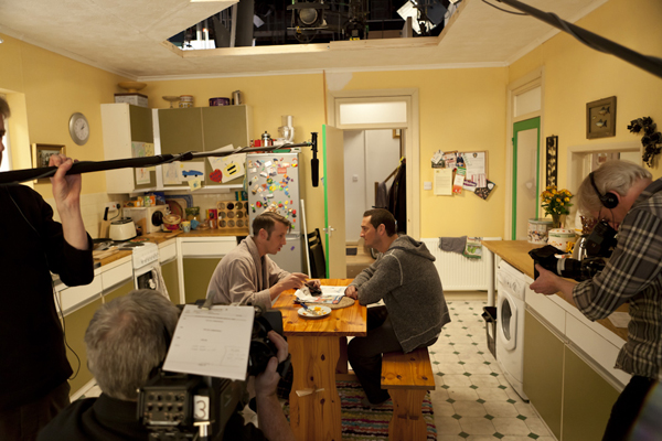 Two hand-held camera operators and the boom operator record Liam (Will Mellor) and his brother Tony (Craig Parkinson).