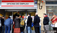 A queue of people at an employment office in Madrid, Spain