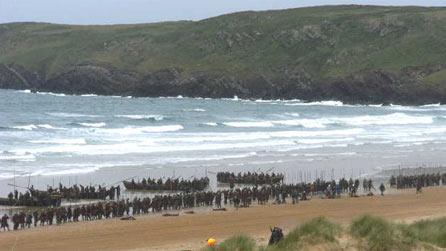 Behind the scenes photo of actors on Freshwater West beach © Scotty