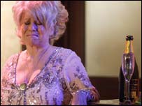 Woman with champagne, crying