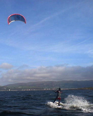 A kitesurfer on the sea around Millport
