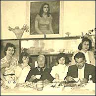 Easter Celebration with Portrait on wall of Emily's mother?