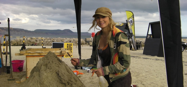 Nicola Wood building a sand sculpture