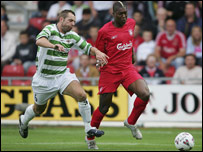 Holmes tries to keep up with Cisse