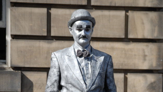 Mime artist dressed as Charlie Chaplin