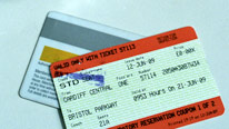 A train ticket and membership card