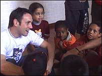 Simon Giarchi with Brazilian children 