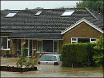 House surounded by flood water