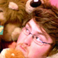 Bernie's boyfriend Steve under a mountain of Bernie's teddy bears!