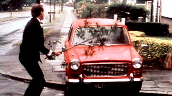 John Cleese as Basil Fawlty