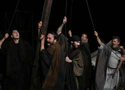 The disciples struggle to keep the boat under control in the storm