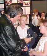 Carl Chinn talking to some of the Sense of Place winners 