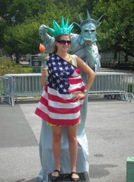 Lucy as the Lady Liberty, in Battery Park, just opposite the Statue of Liberty itself.
