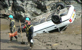 A car swept away by the flood