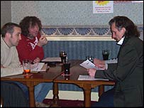 Group talking in a pub