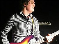 Gaz from the band plays Bass
