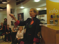 Ilona Sekacz, Musical Director leading the choir