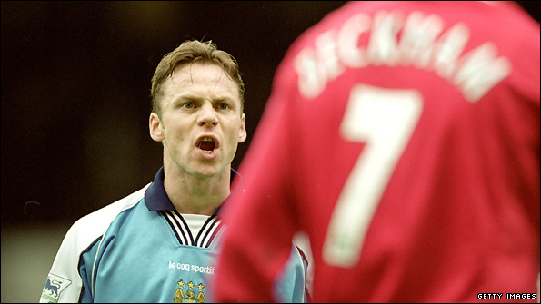 Paul Dickov playing for Manchester City against Manchester United