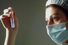Woman holds a semen sample