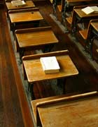 Amish schoolroom with wooden desks and books