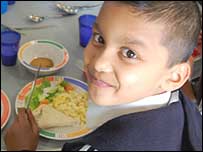 Child at Green Lane Primary eating dinner!