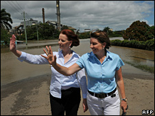 Julia Gillard (rear) and Anna Bligh in Bundaberg on 31 December 2010