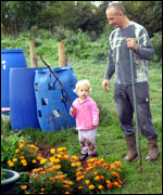 man and child on the allotment
