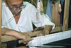Image: man at silk loom